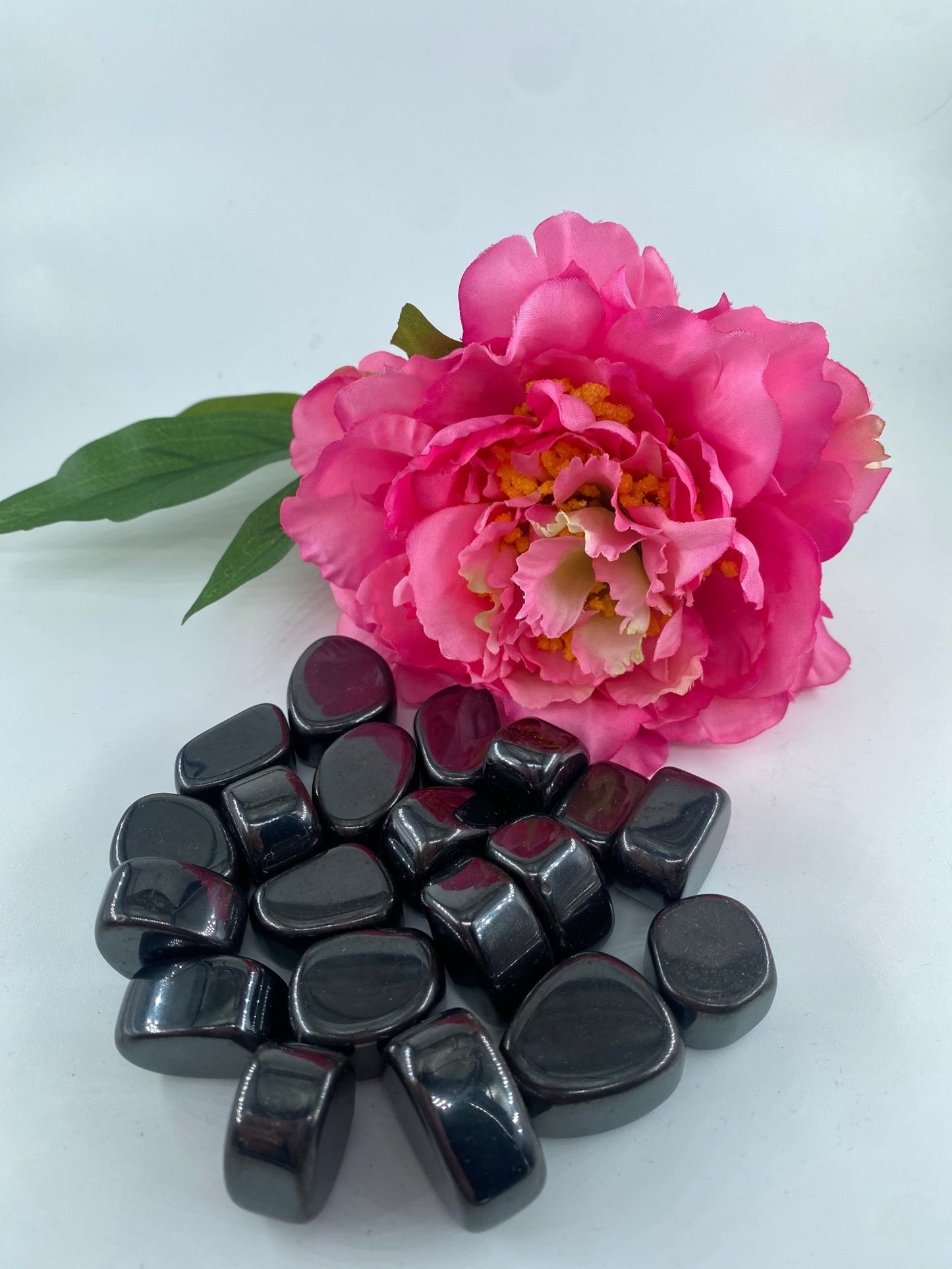 Polished Hematite - Tumble Stone featuring metallic grey sheen and mirror finish - Positive Faith Hope Love