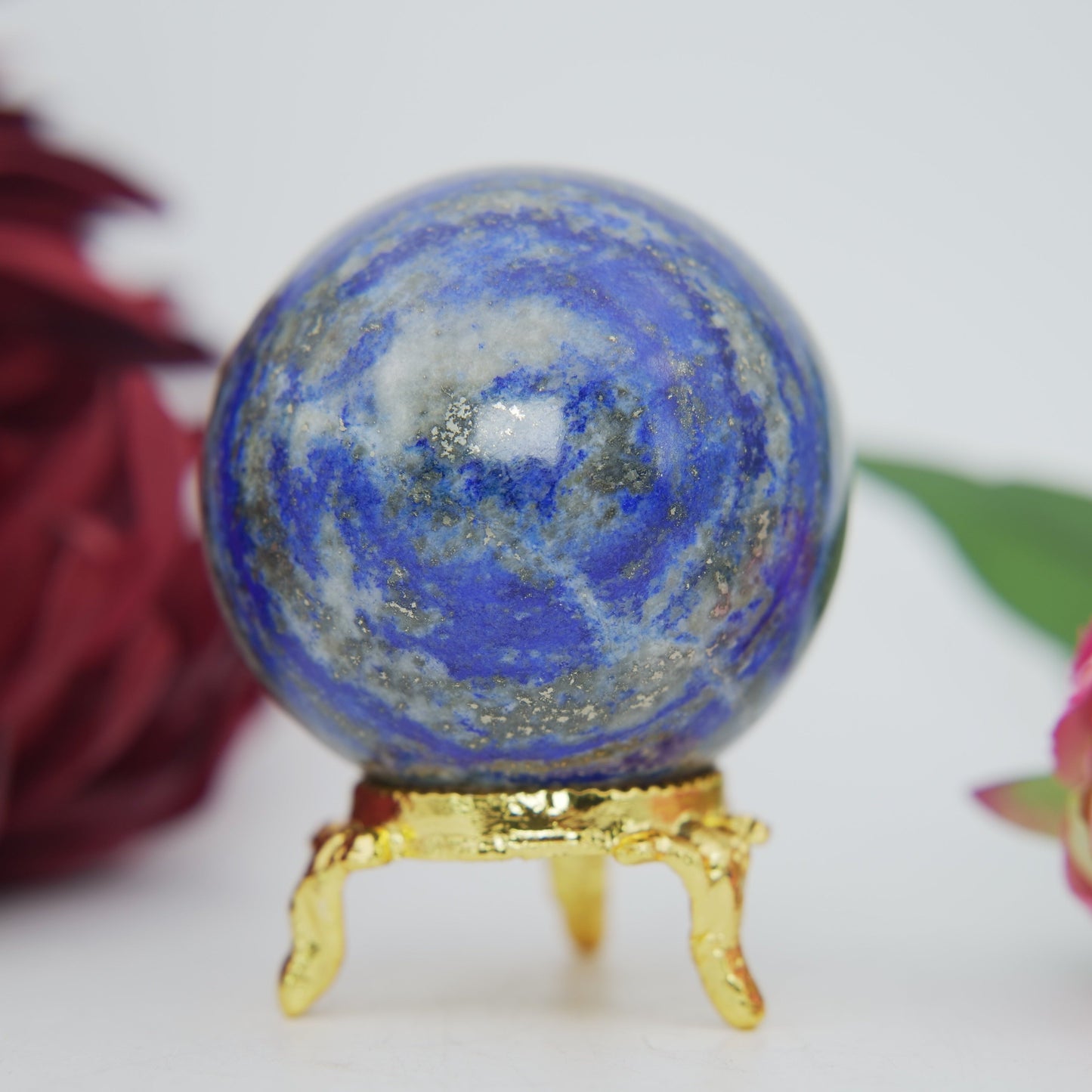 Polished Lapis Lazuli Sphere 249g 55mm featuring royal blue tone with gold pyrite flecks - Positive Faith Hope Love