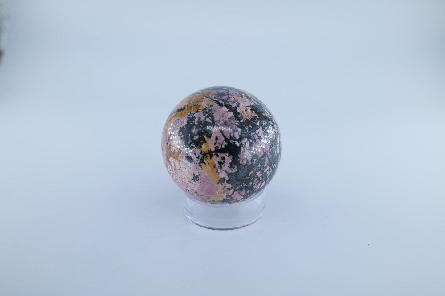 Polished Rhodonite Sphere Pakistan 440 grams featuring pink tone with black veining - Positive Faith Hope Love