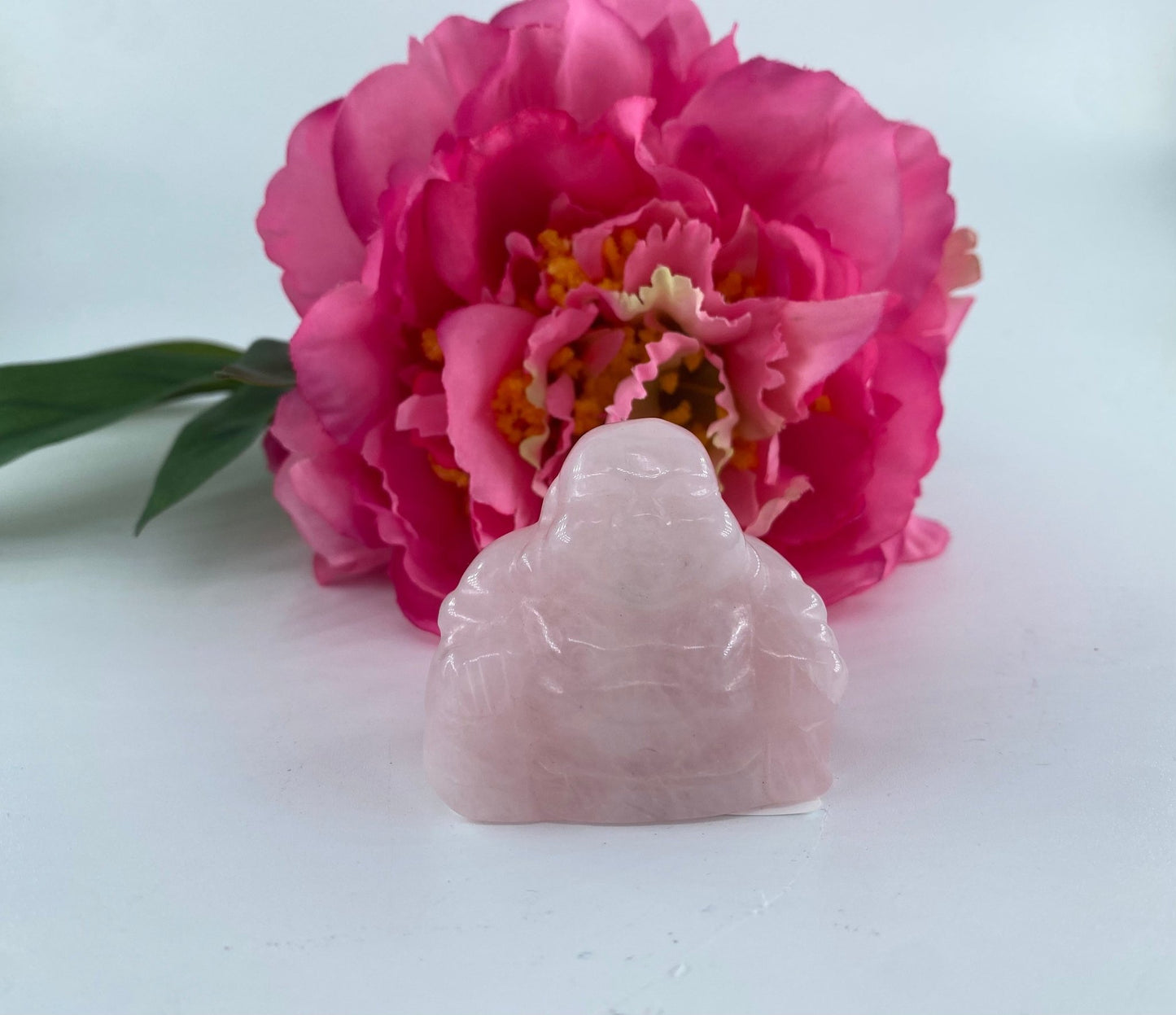 Polished Rose Quartz Buddha featuring soft pink tone and gentle translucence - Positive Faith Hope Love