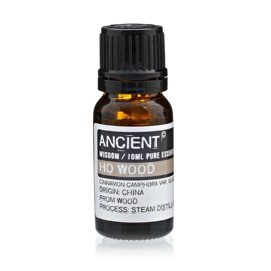 Polished 10 ml Ho Wood Essential Oil featuring natural patterning and unique variations - Positive Faith Hope Love
