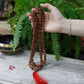 Polished 108 Rudraksha Mala Brown featuring natural patterning and unique variations - Positive Faith Hope Love