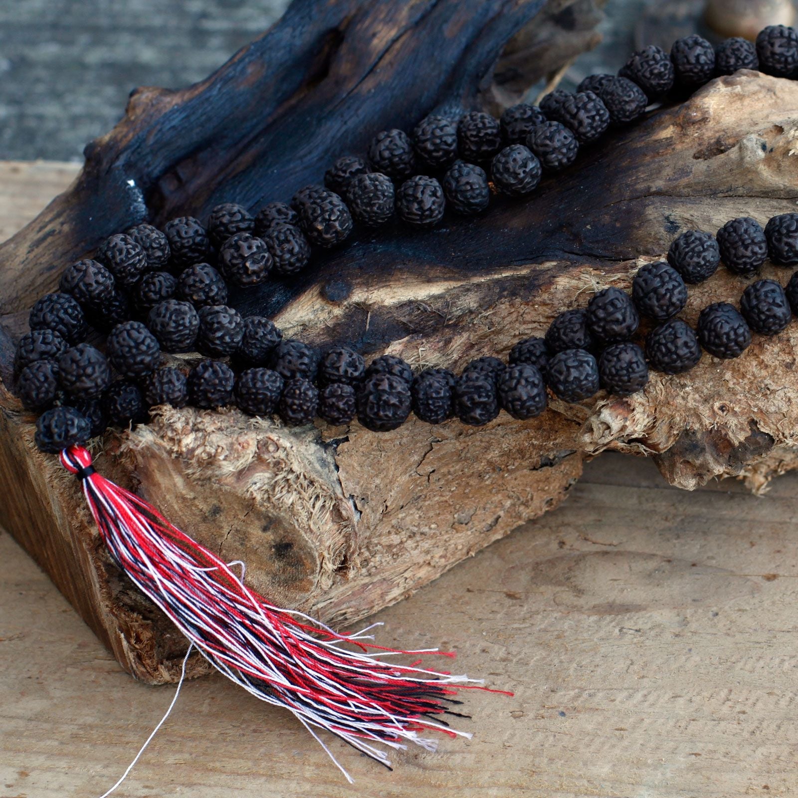 Polished 108 Rudraksha Mala Dark featuring natural patterning and unique variations - Positive Faith Hope Love