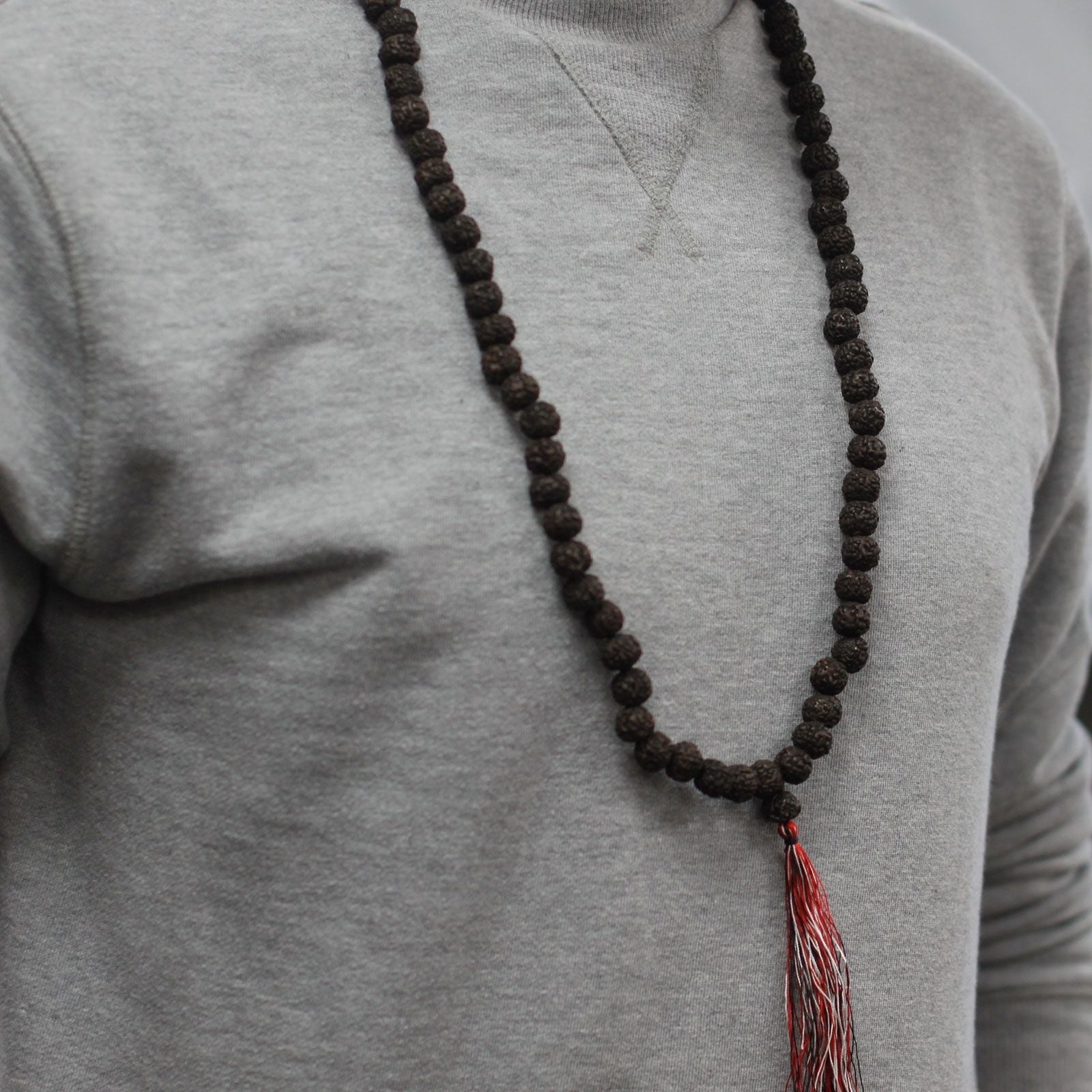 Polished 108 Rudraksha Mala Dark featuring natural patterning and unique variations - Positive Faith Hope Love