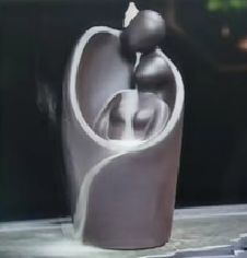 Polished Backflow Incense Burner In Your Lovers Arms 1 featuring natural patterning and unique variations - Positive Faith Hope Love