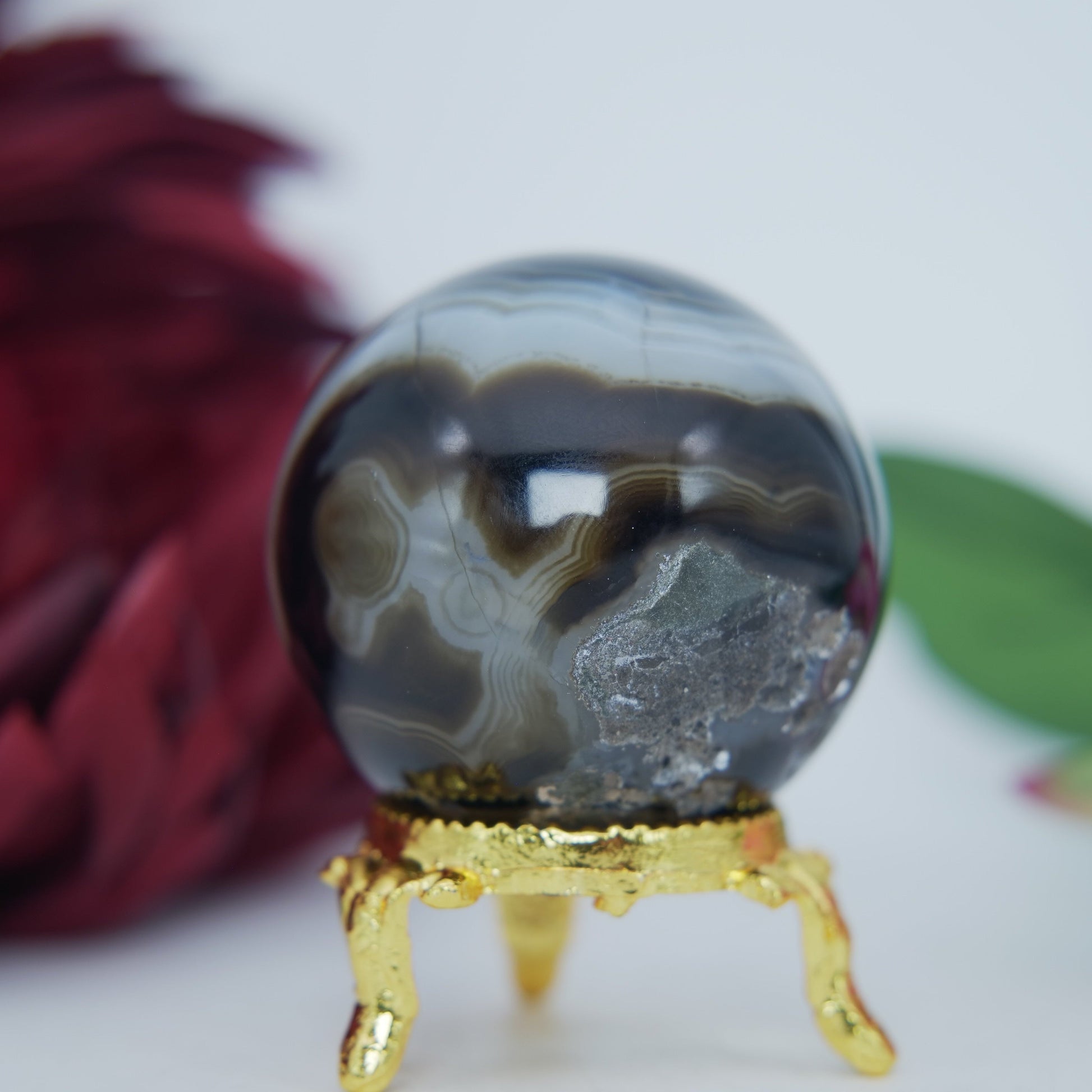 Polished Black And White Agate Sulemani Sphere 130G 45Mm 123459439 27 featuring banded patterns and glossy finish - Positive Faith Hope Love