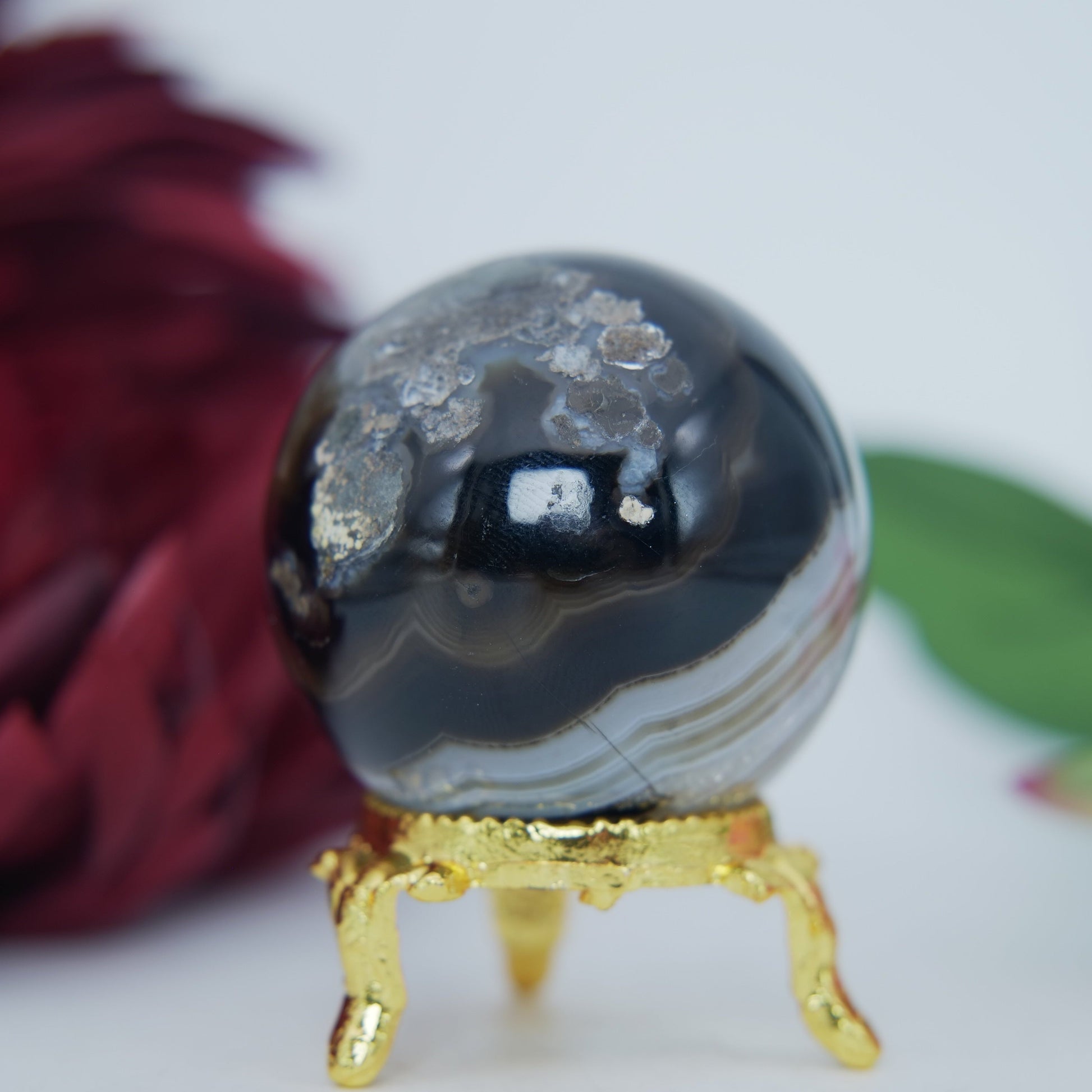 Polished Black And White Agate Sulemani Sphere 130G 45Mm 123459439 27 featuring banded patterns and glossy finish - Positive Faith Hope Love