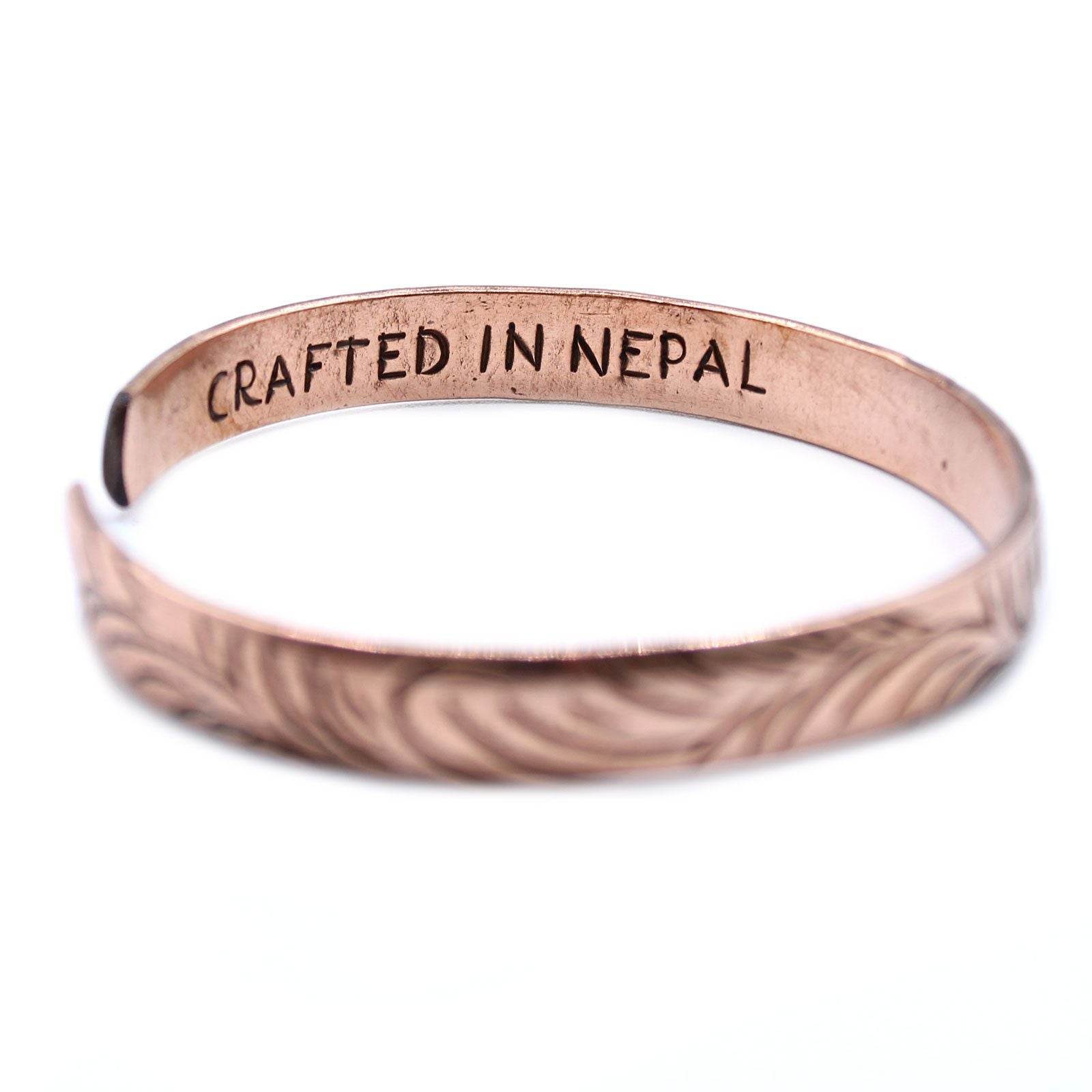 Polished Copper Tibetan Bracelet Slim Tribal Swirls featuring natural patterning and unique variations - Positive Faith Hope Love