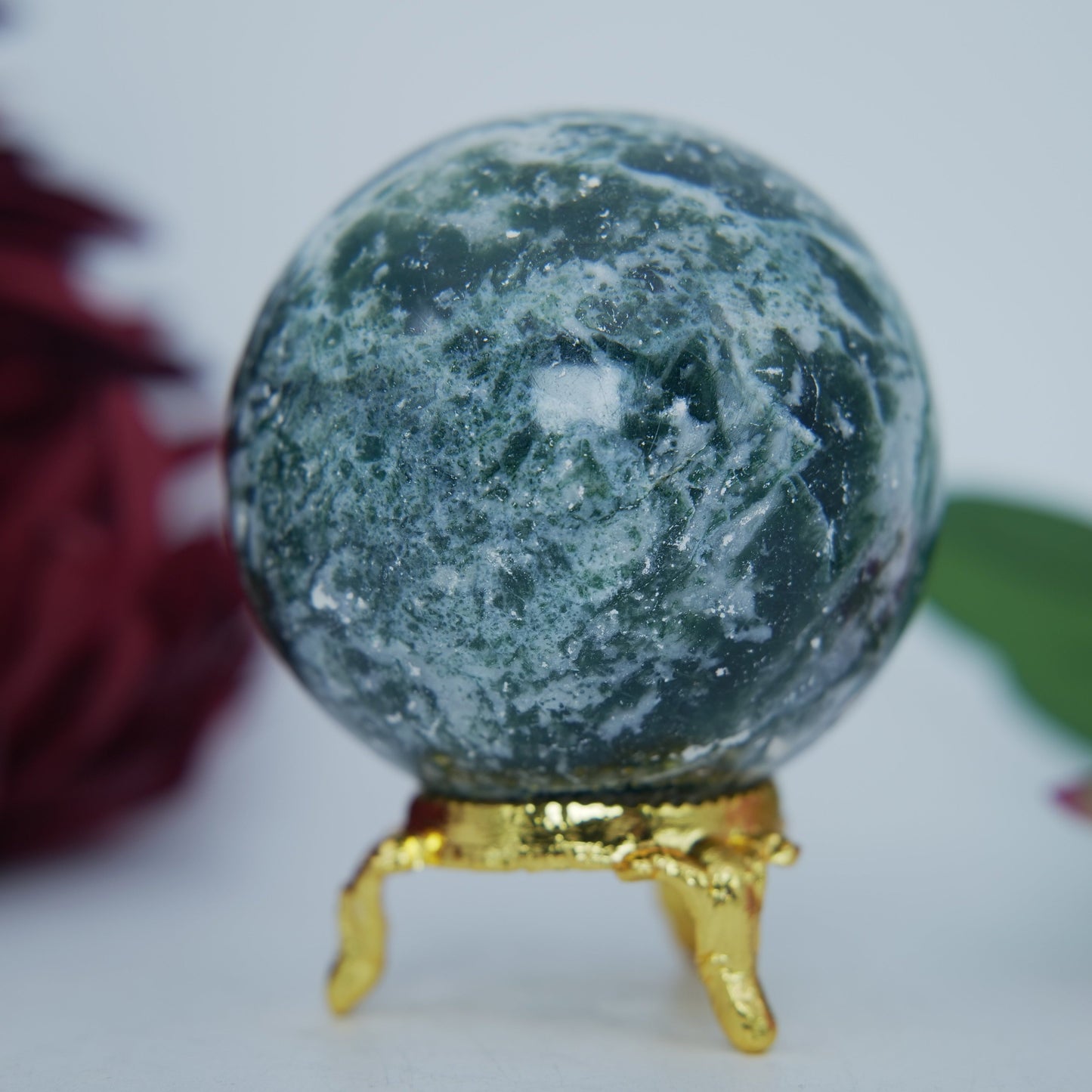 Polished Moss Agate Sphere 285G 60Mm featuring green mossy inclusions in translucent base - Positive Faith Hope Love