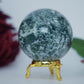 Polished Moss Agate Sphere 285G 60Mm featuring green mossy inclusions in translucent base - Positive Faith Hope Love
