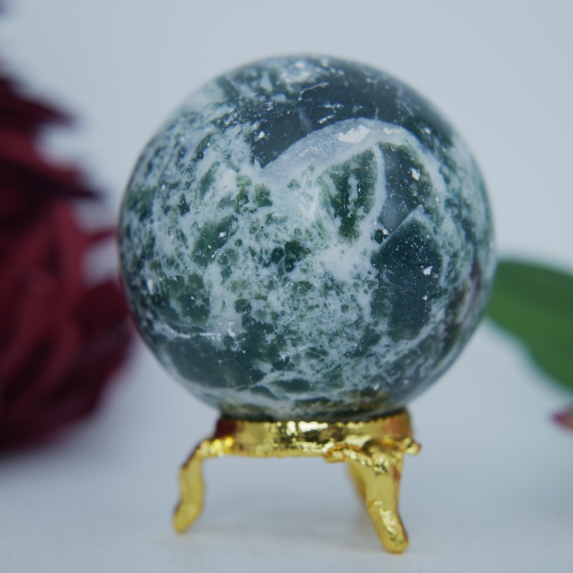 Polished Moss Agate Sphere 285G 60Mm featuring green mossy inclusions in translucent base - Positive Faith Hope Love