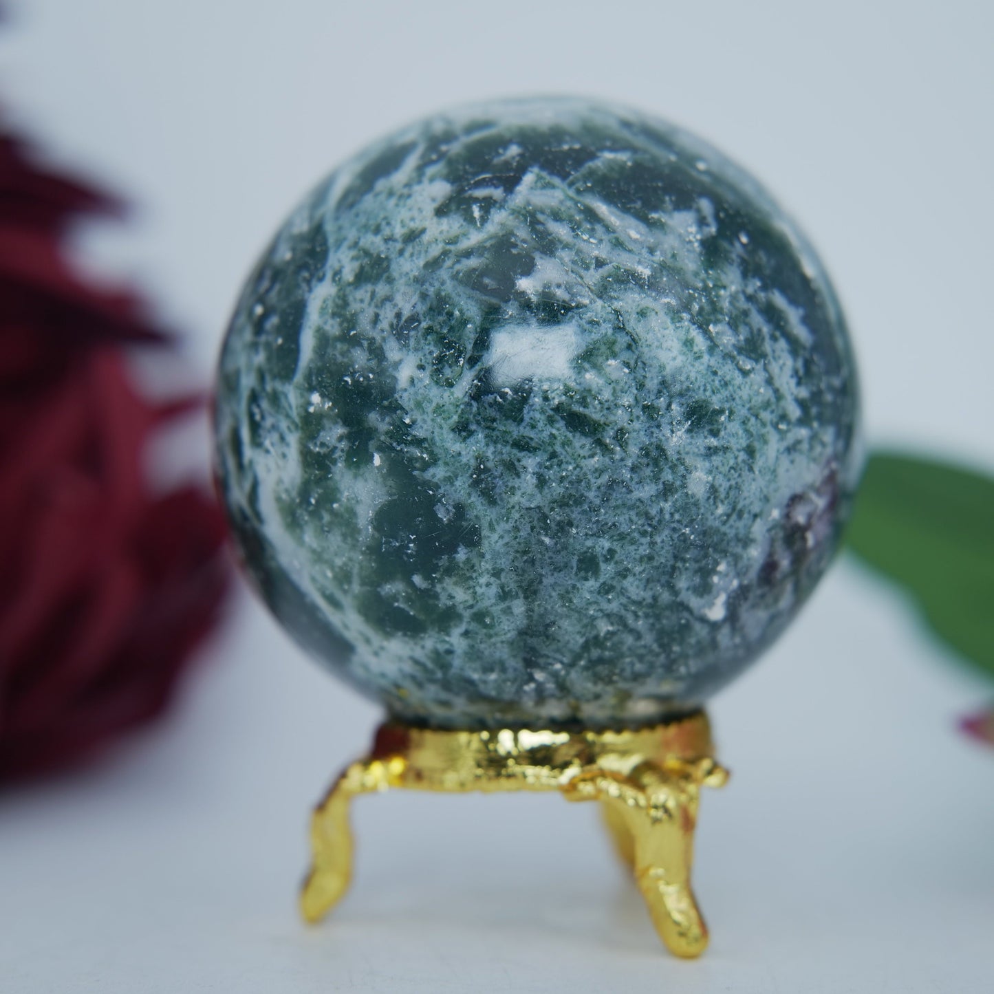 Polished Moss Agate Sphere 285G 60Mm featuring green mossy inclusions in translucent base - Positive Faith Hope Love
