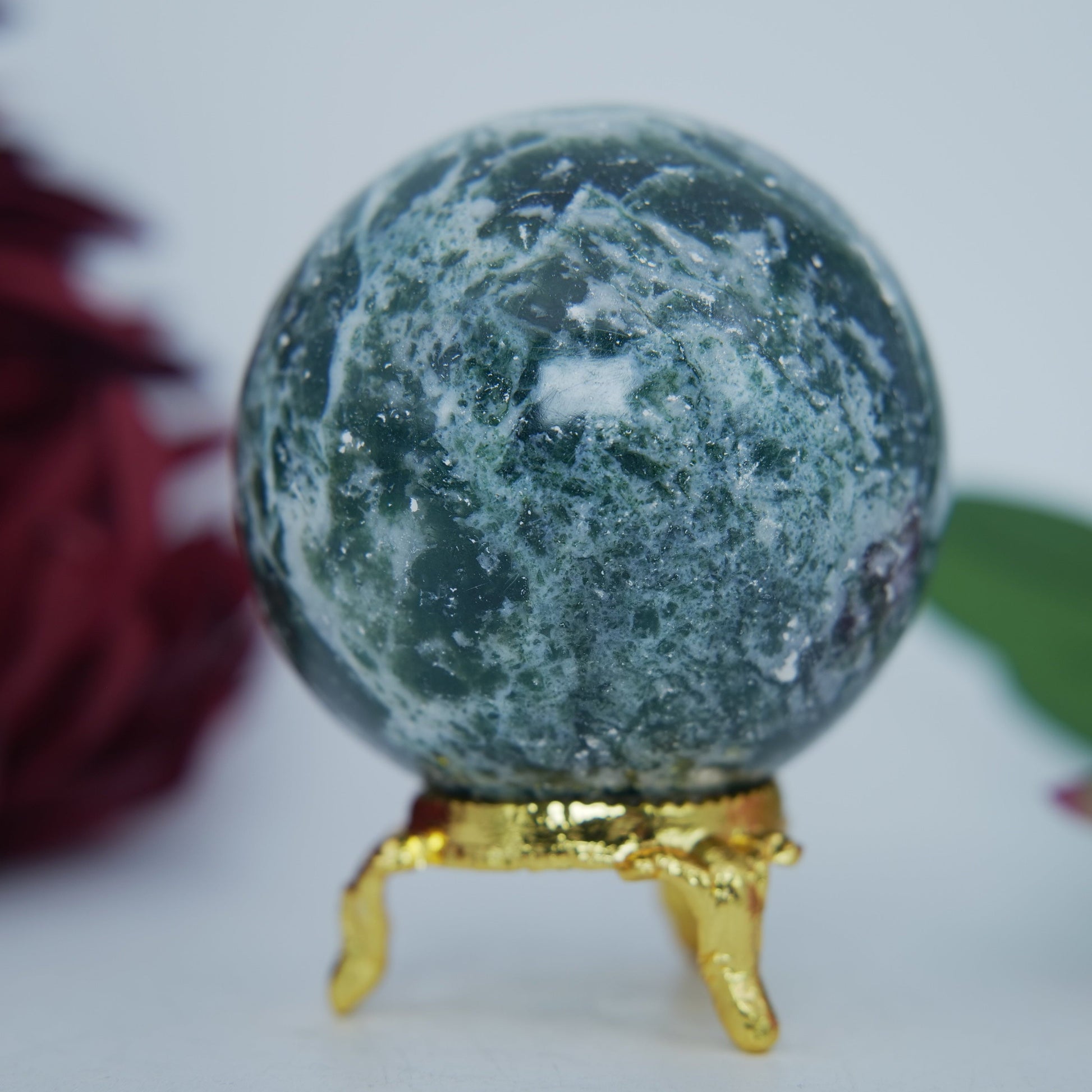 Polished Moss Agate Sphere 285G 60Mm featuring green mossy inclusions in translucent base - Positive Faith Hope Love