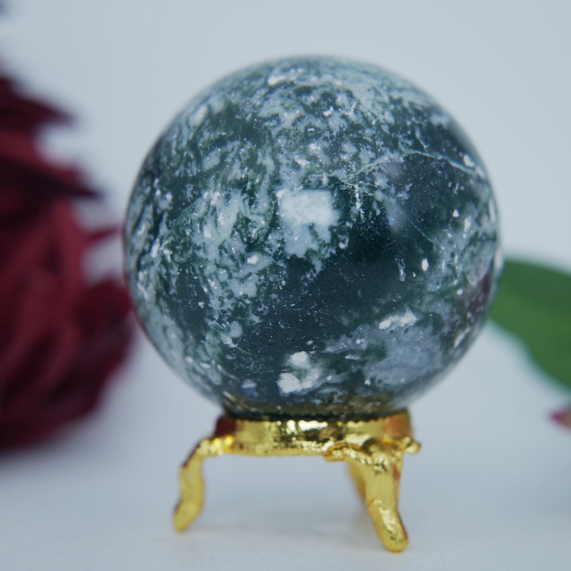 Polished Moss Agate Sphere 285g 60mm featuring green mossy inclusions in translucent base - Positive Faith Hope Love