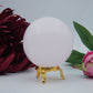 Polished Pink Mangano Calcite Sphere 451 Grams featuring soft translucent tone and gentle sheen - Positive Faith Hope Love