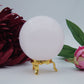 Polished Pink Mangano Calcite Sphere 451 Grams featuring soft translucent tone and gentle sheen - Positive Faith Hope Love
