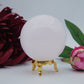 Polished Pink Mangano Calcite Sphere 451g 70mm featuring soft translucent tone and gentle sheen - Positive Faith Hope Love