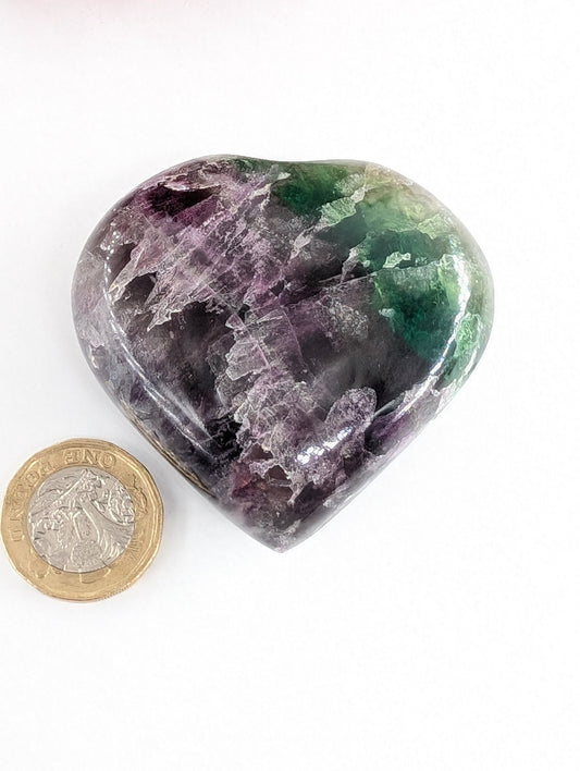 Polished Rainbow Fluorite Heart Palmstone 60Mm featuring banded green‑purple hues and glassy clarity - Positive Faith Hope Love