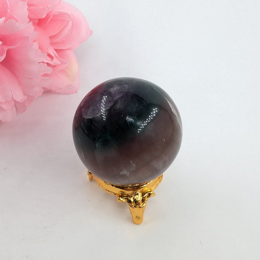 Polished Rainbow Fluorite Sphere 167G 47Mm featuring banded green‑purple hues and glassy clarity - Positive Faith Hope Love