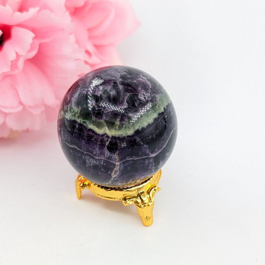 Polished Rainbow Fluorite Sphere 177G 48Mm featuring banded green‑purple hues and glassy clarity - Positive Faith Hope Love