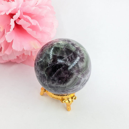 Polished Rainbow Fluorite Sphere 234G 53Mm featuring banded green‑purple hues and glassy clarity - Positive Faith Hope Love