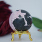 Polished Rhodochrosite Sphere 190G featuring pink bands and glassy finish - Positive Faith Hope Love