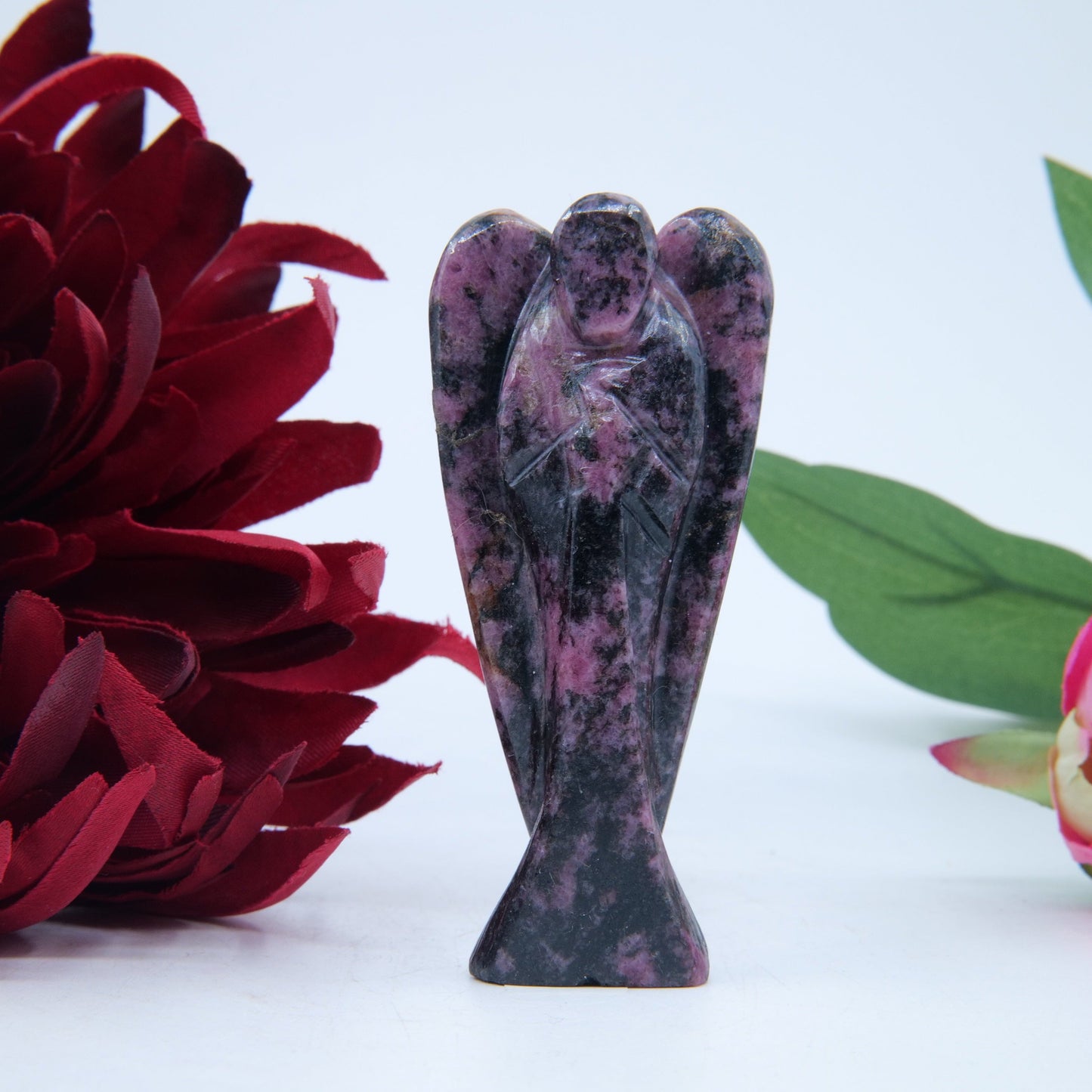 Polished Rhodonite Angel 80Mm featuring pink tone with black veining - Positive Faith Hope Love