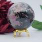 Polished Rhodonite Sphere Madagascar 693G featuring pink tone with black veining - Positive Faith Hope Love