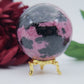 Polished Rhodonite Sphere Madagascar 712G featuring pink tone with black veining - Positive Faith Hope Love