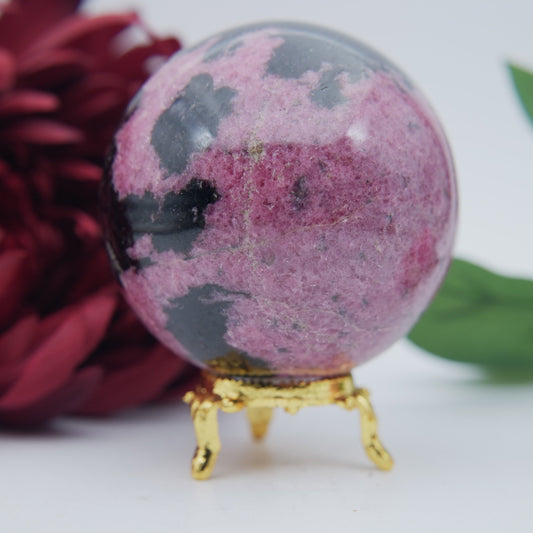 Polished Rhodonite Sphere Madagascar 712g featuring pink tone with black veining - Positive Faith Hope Love