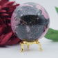 Polished Rhodonite Sphere Madagascar 712G featuring pink tone with black veining - Positive Faith Hope Love