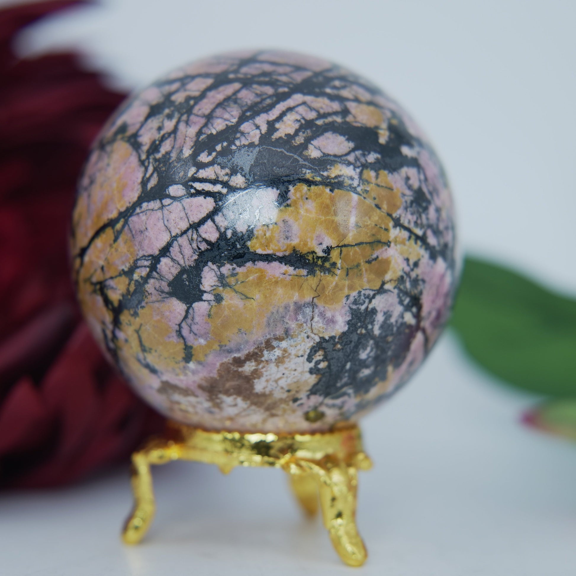 Polished Rhodonite Sphere Pakistan 440G 62Mm featuring pink tone with black veining - Positive Faith Hope Love