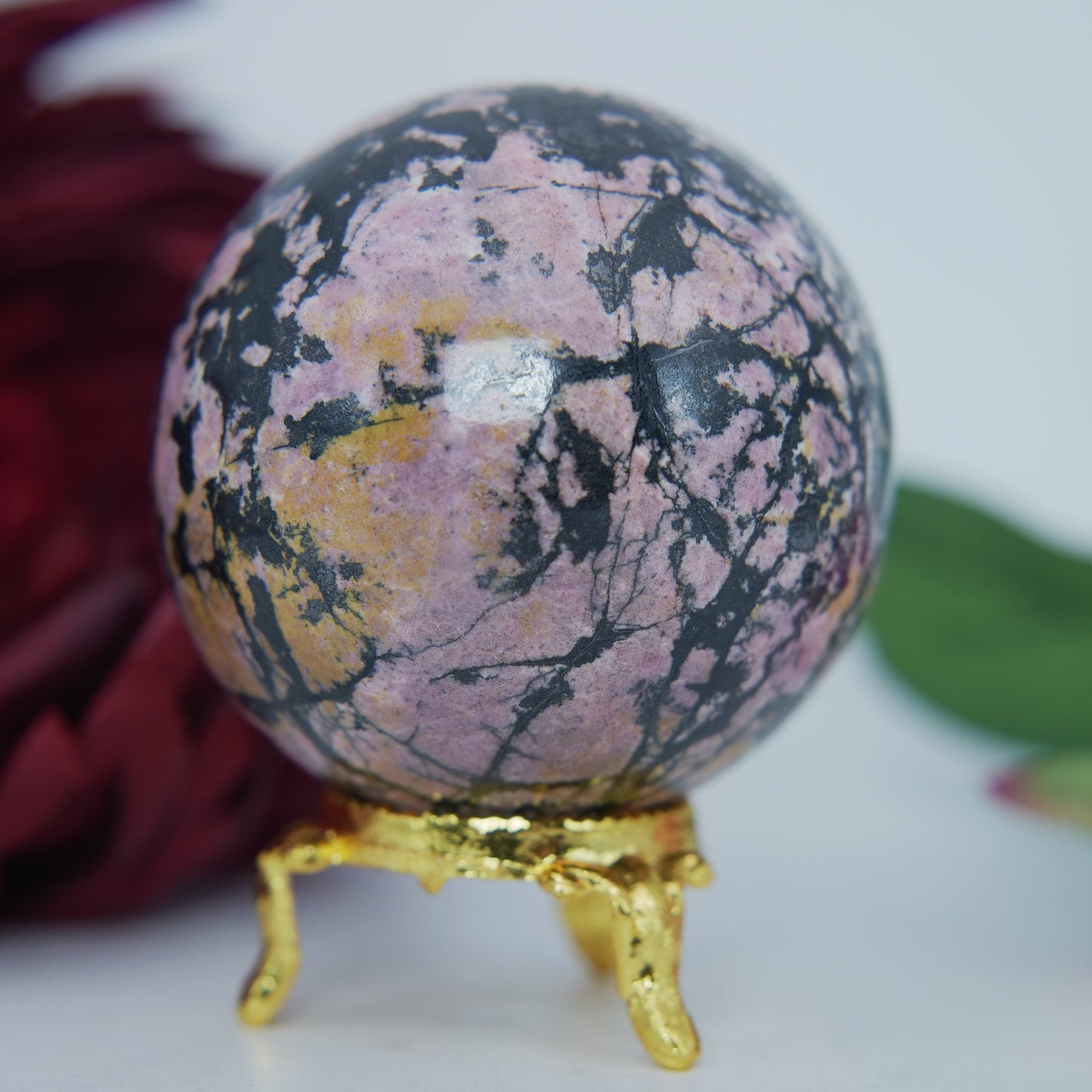 Polished Rhodonite Sphere Pakistan 440G 62Mm featuring pink tone with black veining - Positive Faith Hope Love