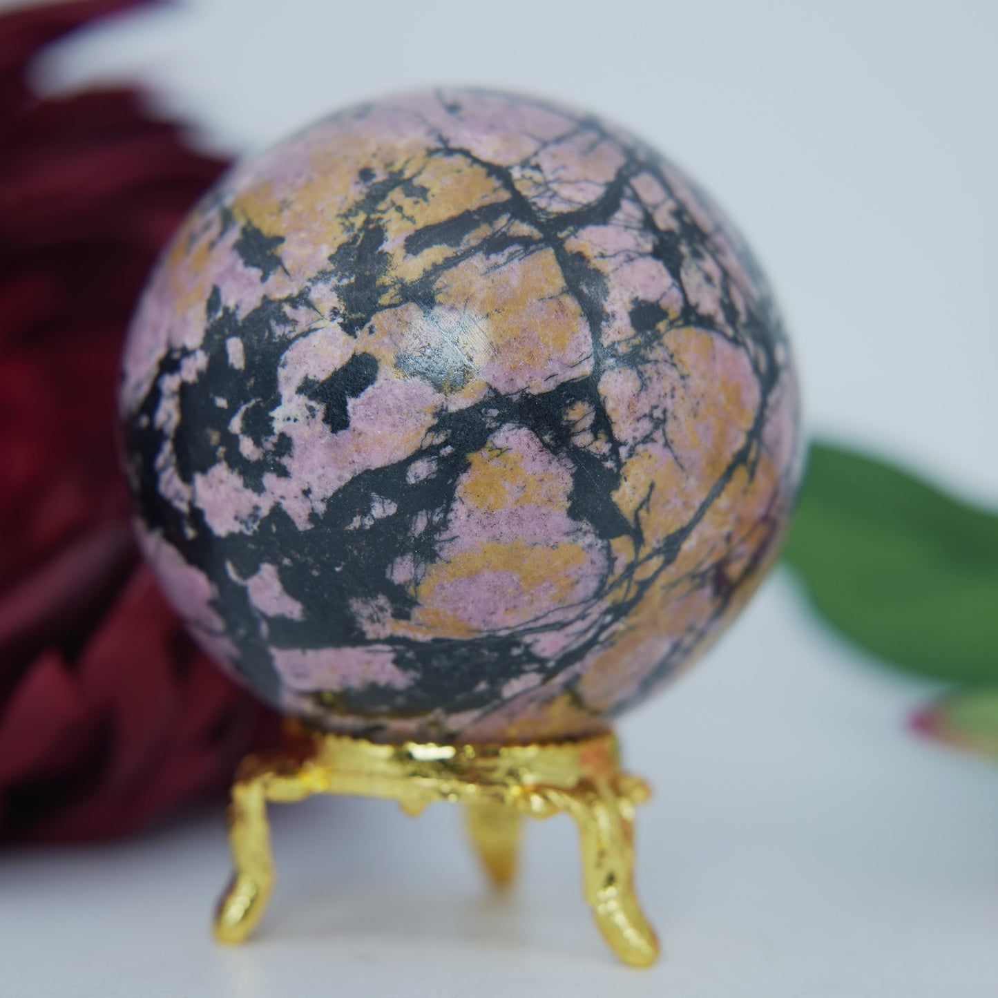 Polished Rhodonite Sphere Pakistan 440G 62Mm featuring pink tone with black veining - Positive Faith Hope Love