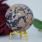 Polished Rhodonite Sphere Pakistan 440G 62Mm featuring pink tone with black veining - Positive Faith Hope Love