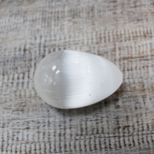 Polished Selenite Egg - 5 - 6 cm featuring satin white sheen and fibrous texture - Positive Faith Hope Love
