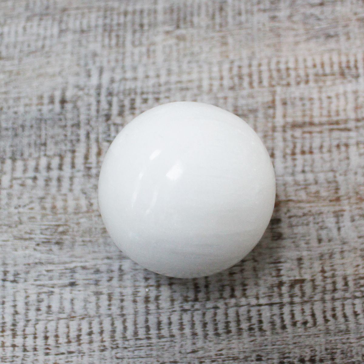 Polished Selenite Sphere - 5-6 cm featuring satin white sheen and fibrous texture - Positive Faith Hope Love