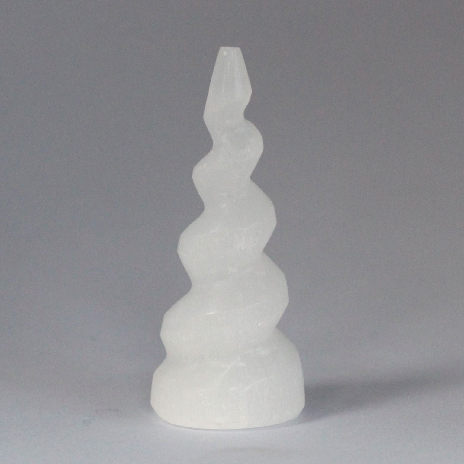 Polished Selenite Spiral Unicorn Horn Tower 10 Cm featuring satin white sheen and fibrous texture - Positive Faith Hope Love