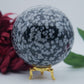 Polished Snowflake Obsidian Sphere 1192G featuring black base with grey snowflake patterns - Positive Faith Hope Love