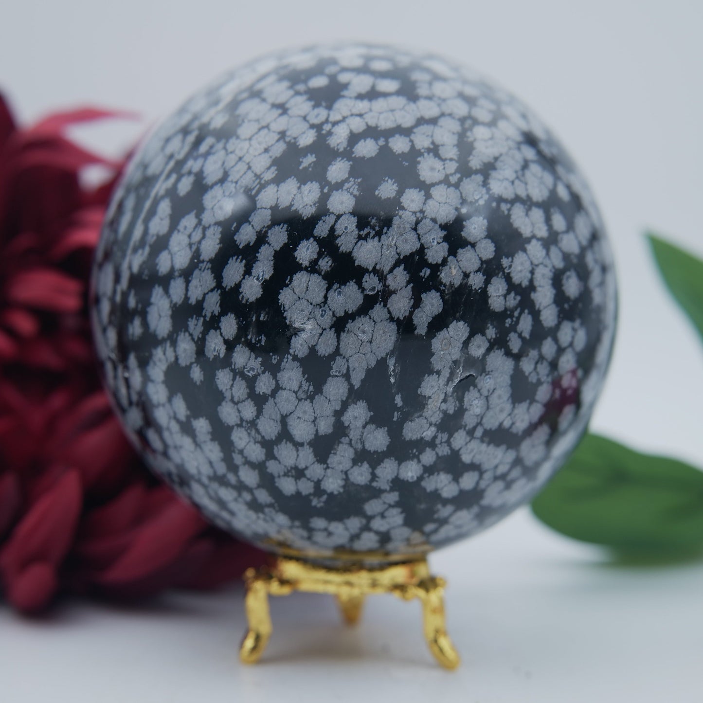 Polished Snowflake Obsidian Sphere 1192G featuring black base with grey snowflake patterns - Positive Faith Hope Love