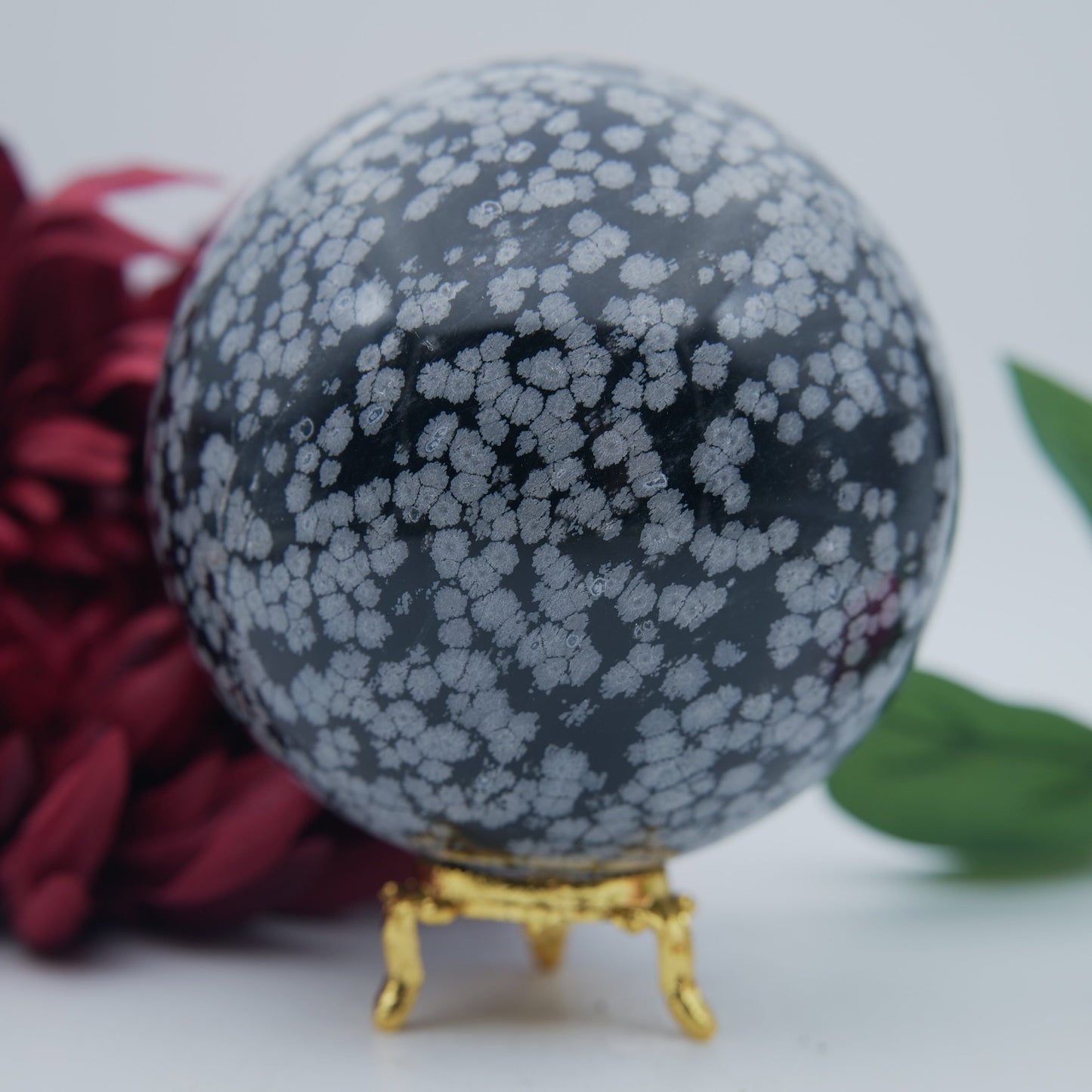 Polished Snowflake Obsidian Sphere 1192G featuring black base with grey snowflake patterns - Positive Faith Hope Love