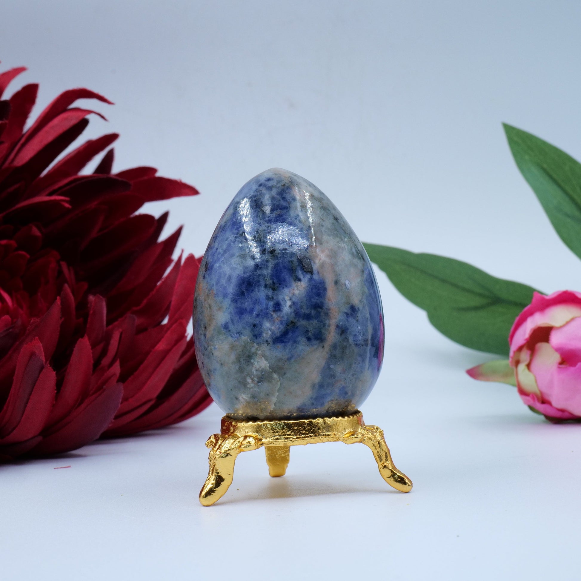 Polished Sodalite Egg 141G 60X40Mm featuring navy-blue tone with white veining - Positive Faith Hope Love