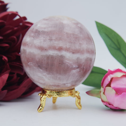 Natural Strawberry Calcite Sphere 526 grams featuring soft translucent tone and gentle sheen - Positive Faith Hope Love