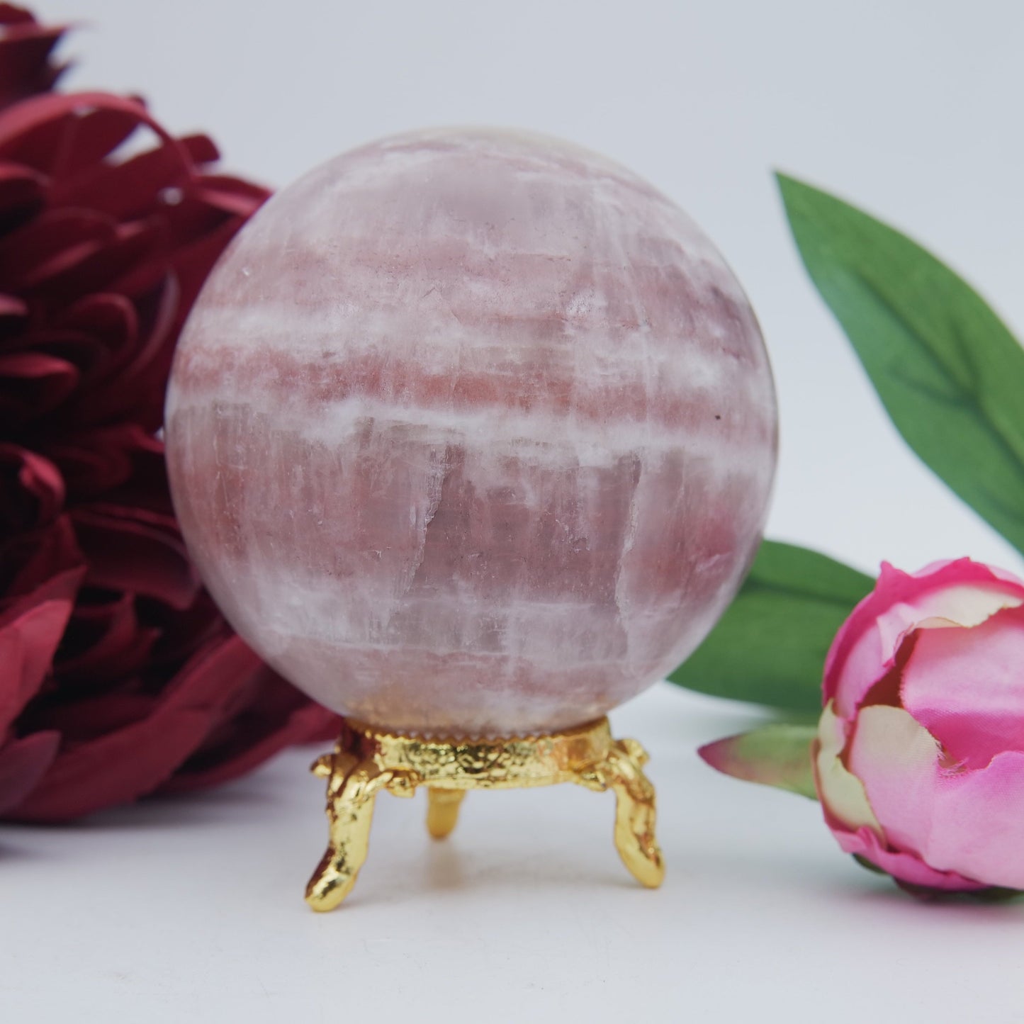 Natural Strawberry Calcite Sphere 526 Grams featuring soft translucent tone and gentle sheen - Positive Faith Hope Love