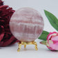 Natural Strawberry Calcite Sphere 526 Grams featuring soft translucent tone and gentle sheen - Positive Faith Hope Love