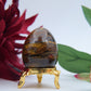 Polished Tigers Eye Crystal Egg featuring chatoyant golden-brown bands - Positive Faith Hope Love