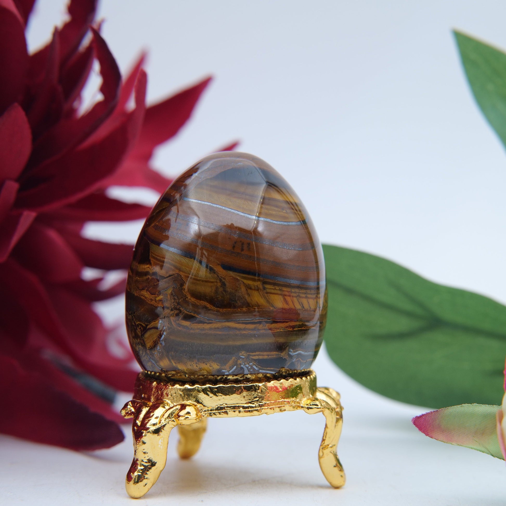 Polished Tigers Eye Crystal Egg featuring chatoyant golden-brown bands - Positive Faith Hope Love