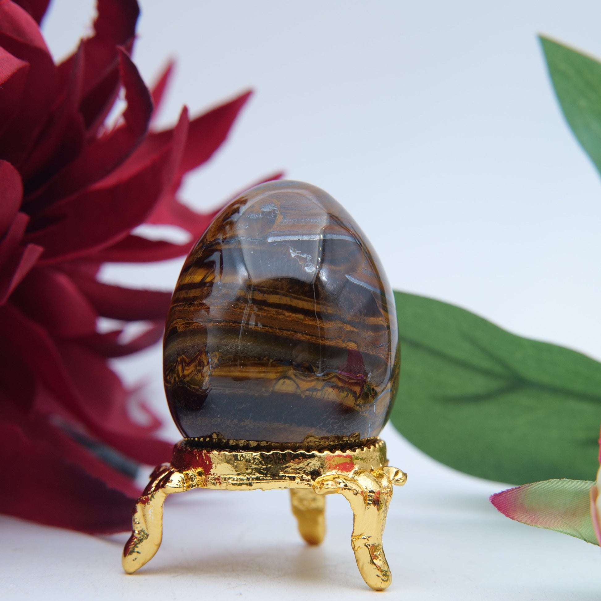 Polished Tigers Eye Crystal Egg featuring chatoyant golden-brown bands - Positive Faith Hope Love