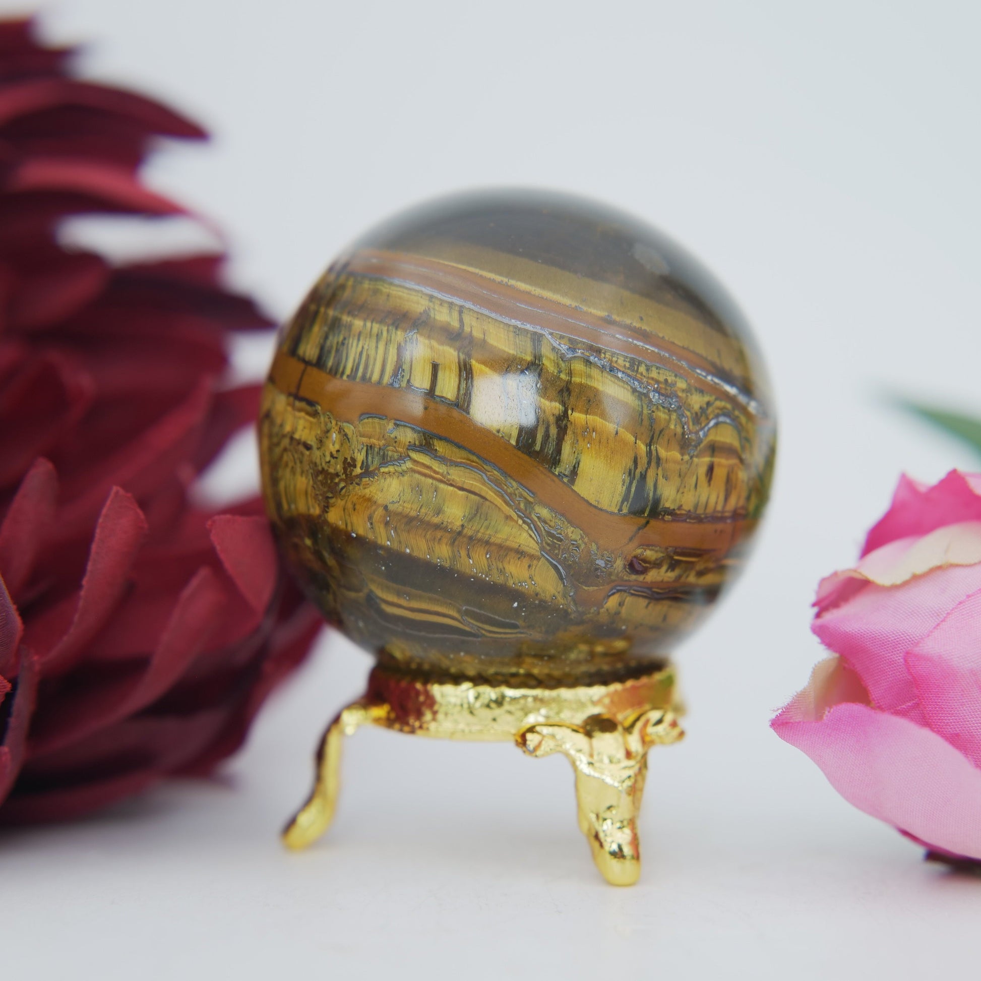 Polished Tigers Eye Sphere 205g 50mm featuring chatoyant golden-brown bands - Positive Faith Hope Love