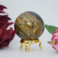 Polished Tiger Eye Sphere 205G 50Mm featuring natural patterning and unique variations - Positive Faith Hope Love